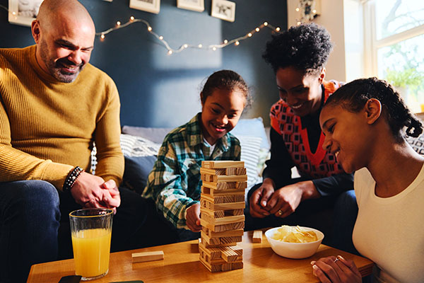 A family playing Jenga